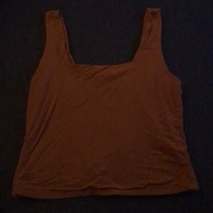a golden cropped tank top